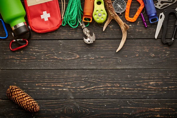 Travel items for hiking over wooden background — Stock Photo, Image