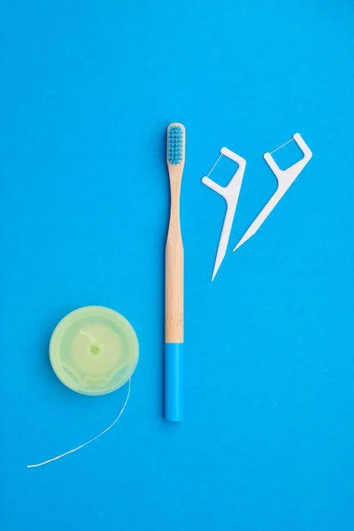 Toothbrushes Oral Care Tools Blue Background Top View Copy Space — Stock Photo, Image