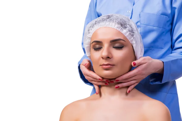 Beautiful young woman during face massage session — Stock Photo, Image