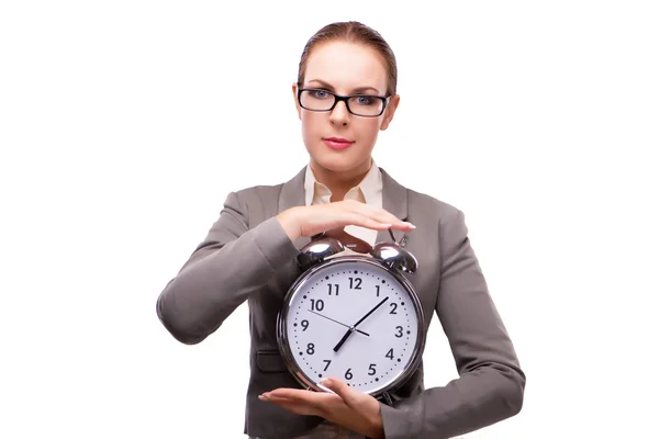 Businesswoman with giant alarm clock isolated on white Royalty Free Stock Images