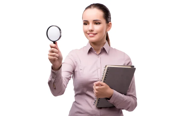 Young student with magnifying glass isolated on white — Stock Photo, Image