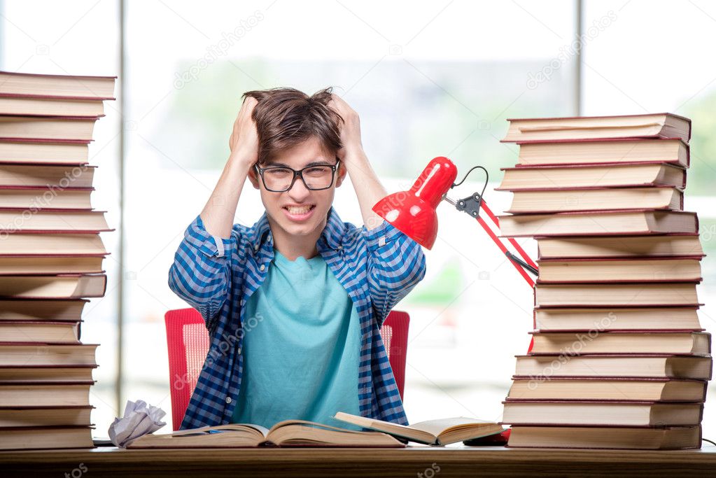 Young man student preparing for college exams