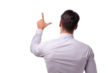 Genç yakışıklı işadamı beyaz izole düğmelere basarak