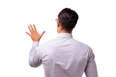 Genç yakışıklı işadamı beyaz izole düğmelere basarak