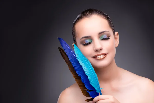 Beautiful woman with writing feather quill — Stock Photo, Image
