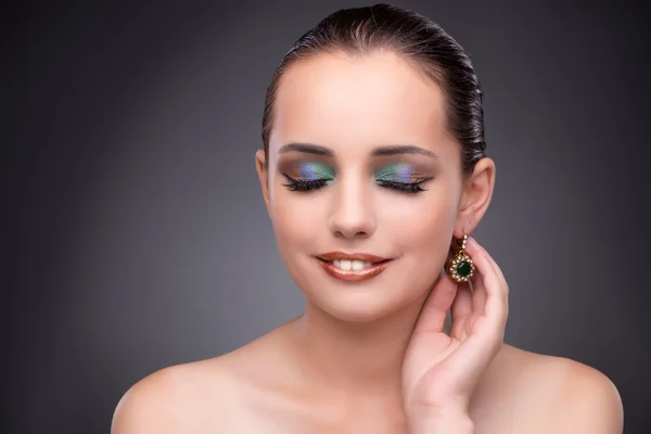 Beautiful woman showing off her jewellery in fashion concept — Stock Photo, Image