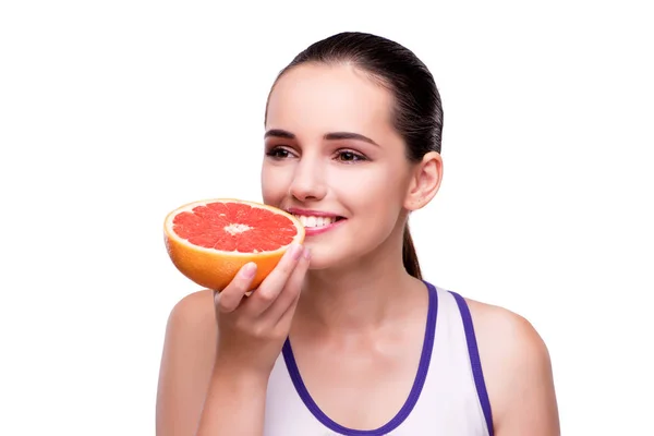 Vrouw met grapefruit geïsoleerd op wit — Stockfoto