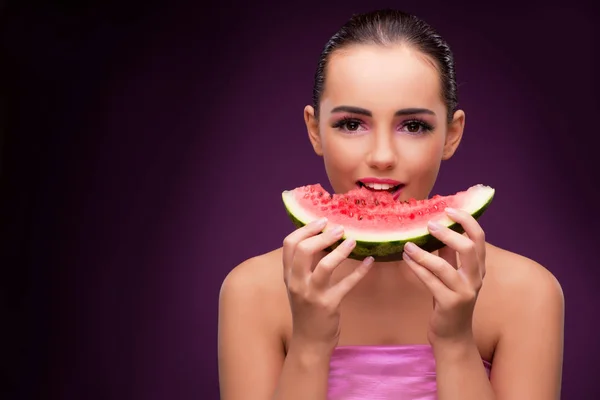 Beautiful woman eating tasty watermelon — Stock Photo, Image