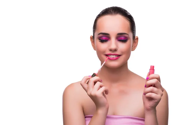 Mujer aplicando lápiz labial aislado sobre blanco — Foto de Stock