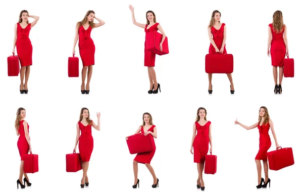 Молодая женщина в красном платье с чемоданом изолированы на белом — стоковое фото