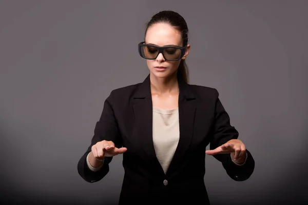 Young woman businesswoman pressing virtual buttons — Stock Photo, Image