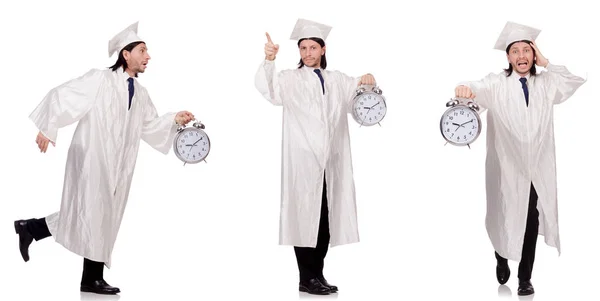 Jeune homme étudiant avec horloge isolé sur blanc — Photo