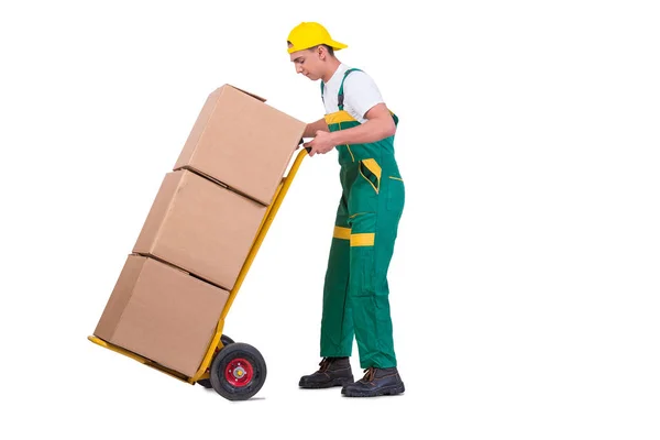 Giovane uomo in movimento scatole con carrello isolato su bianco — Foto Stock