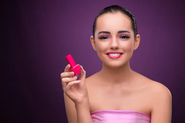 Mulher com tubo de batom no conceito de beleza — Fotografia de Stock