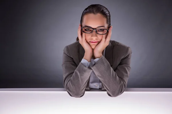 Nice businesswoman against gray background — Stock Photo, Image