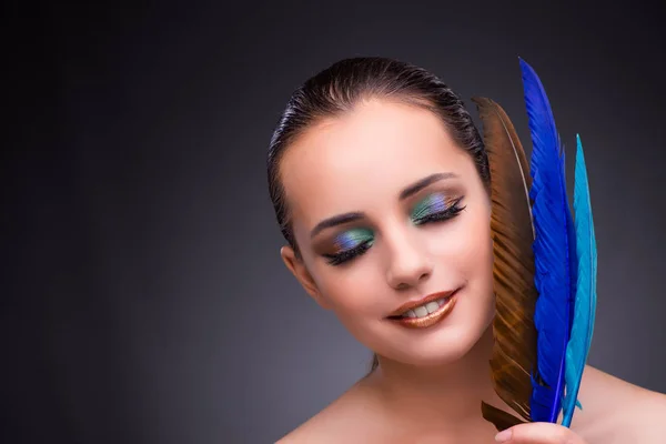 Beautiful woman with writing feather quill — Stock Photo, Image