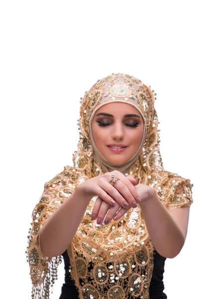 Muslimische Frau in goldenem Einband isoliert auf weiß — Stockfoto