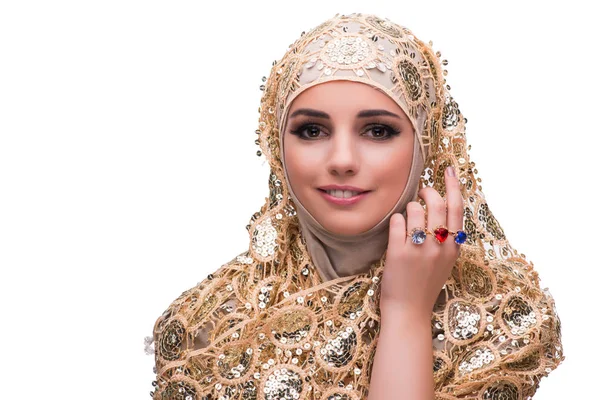 Muslimsk kvinna i guld omfattar isolerade på vit — Stockfoto