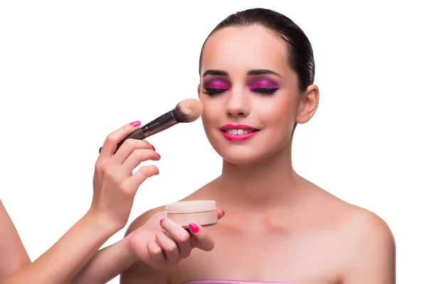 Mujer consiguiendo maquillaje aislado en blanco —  Fotos de Stock