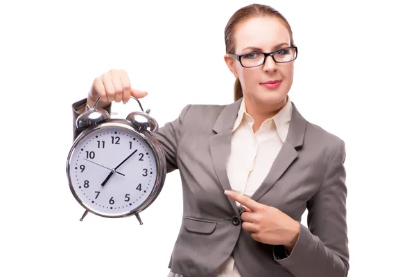 Mujer de negocios con reloj despertador gigante aislado en blanco —  Fotos de Stock