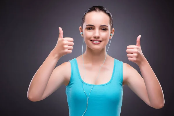 Mujer en concepto deportivo con pulgar hacia arriba —  Fotos de Stock