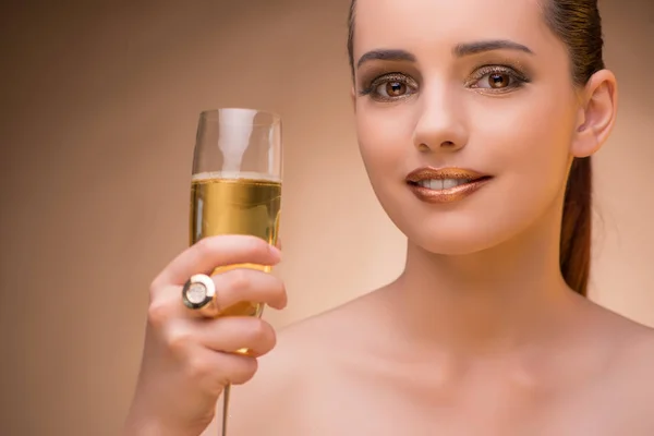 Young woman with champagne glass — Stock Photo, Image