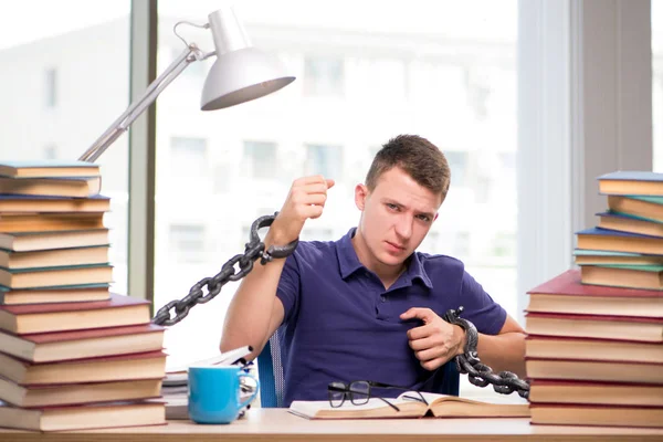 Young student forced to study tied — Stock Photo, Image