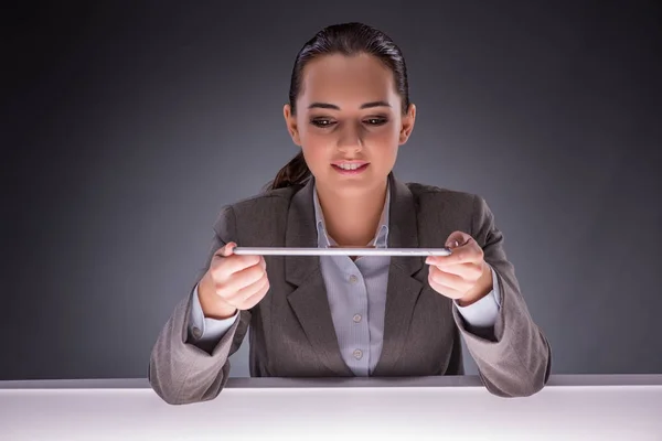 Young woman with tablet in business concept — Stock Photo, Image