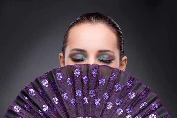 Beautiful woman with fan in fashion concept — Stock Photo, Image