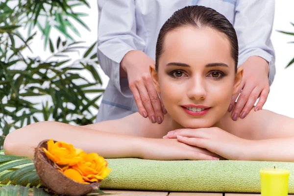 Woman during massage session in spa salon — Stock Photo, Image