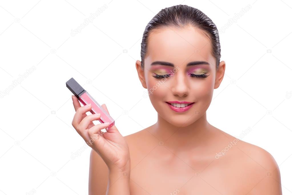 Woman with nail polish tube isolated on white
