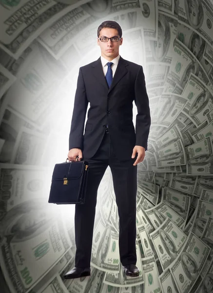 Uomo d'affari che lotta contro l'imbuto dollaro — Foto Stock
