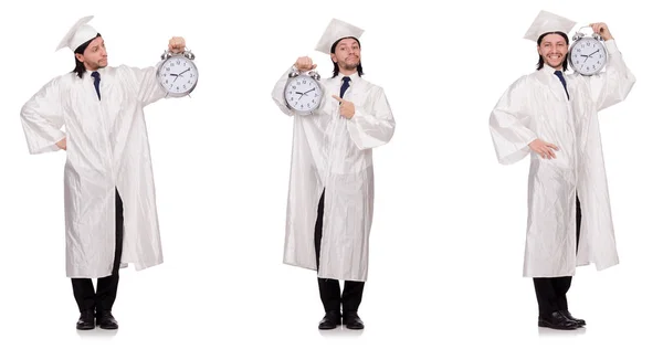 Jeune homme étudiant avec horloge isolé sur blanc — Photo