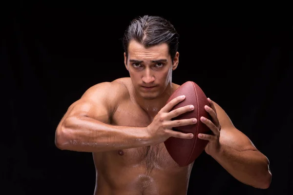 Strappato muscolare uomo con americano calcio — Foto Stock