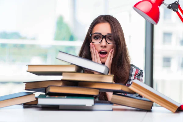 Young woman student with many books — Stock Photo, Image