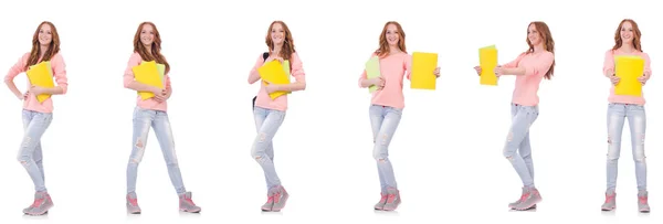 Joven estudiante con cuadernos aislados en blanco — Foto de Stock