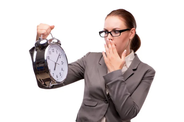 Mujer de negocios con reloj despertador gigante aislado en blanco —  Fotos de Stock