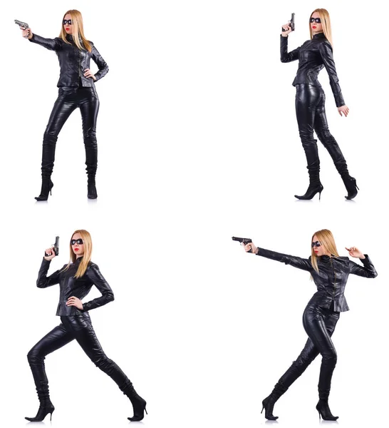 Kvinde i læder kostume med pistol isoleret på hvid - Stock-foto