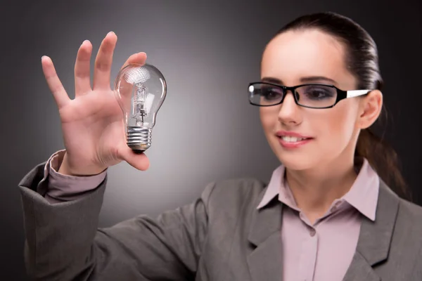 Bright idea concept with woman businesswoman — Stock Photo, Image
