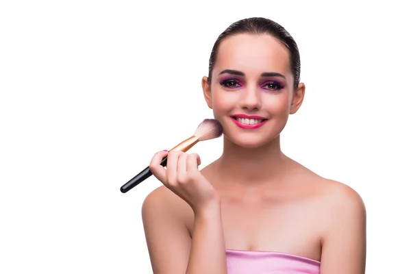 Mulher ficando maquiagem isolada no branco — Fotografia de Stock