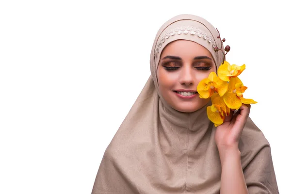 Arabian kvinna med orkidé blomma isolerad på vit — Stockfoto