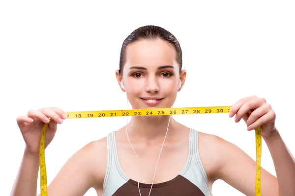 Mujer joven con centímetro en concepto de dieta —  Fotos de Stock