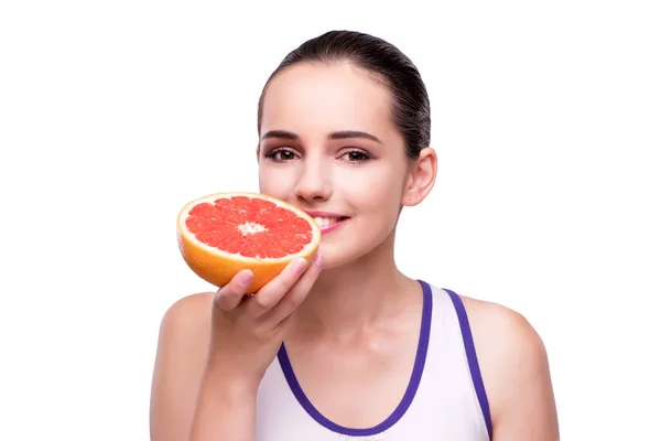 Vrouw met grapefruit geïsoleerd op wit — Stockfoto