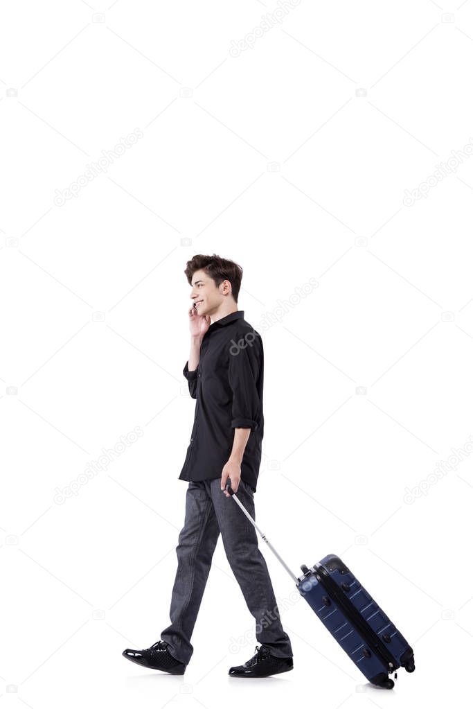 Young man in travel concept isolated on white
