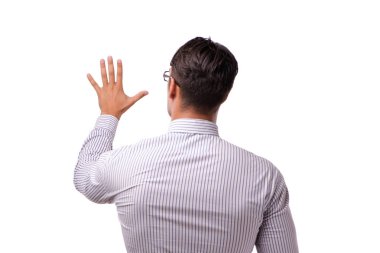 Genç yakışıklı işadamı beyaz izole düğmelere basarak