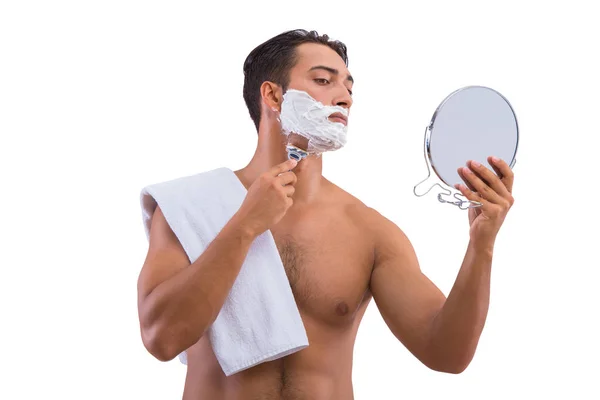 Чоловік голиться ізольовано на білому тлі — стокове фото