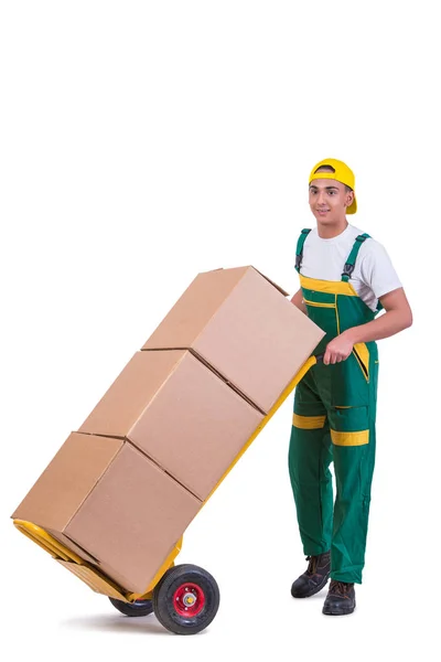 Giovane uomo in movimento scatole con carrello isolato su bianco — Foto Stock