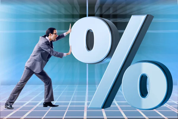 Empresário no conceito de altas taxas de juros — Fotografia de Stock