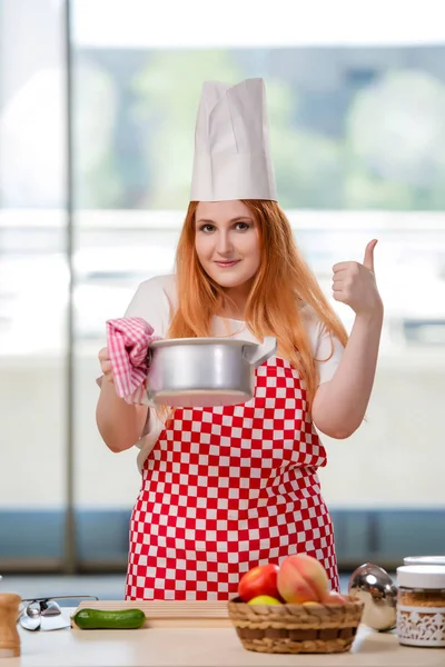 Redhead cook working in the kitchen — Stock Photo, Image