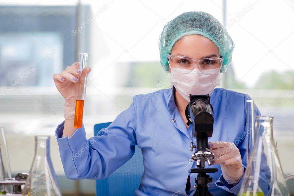 Woman chemist working in the lab